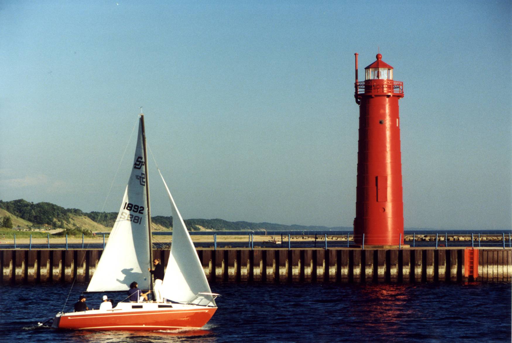Muskegon Lighthouse & Sailboat